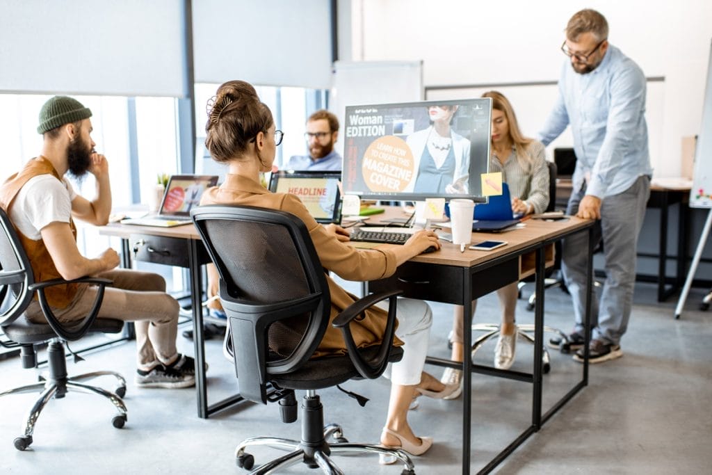 Web Designer working on team project