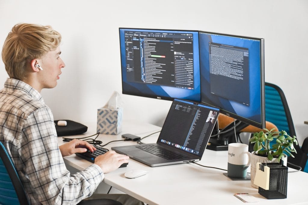 PA Developer working on computer | Long-Term Website Value | Web Design Services for Manufacturing Companies