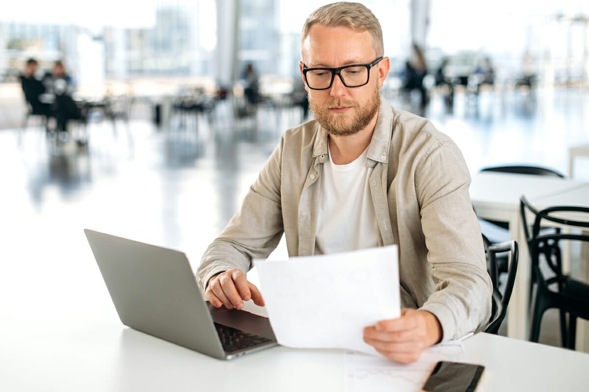 Person works on SEO Strategy on laptop
