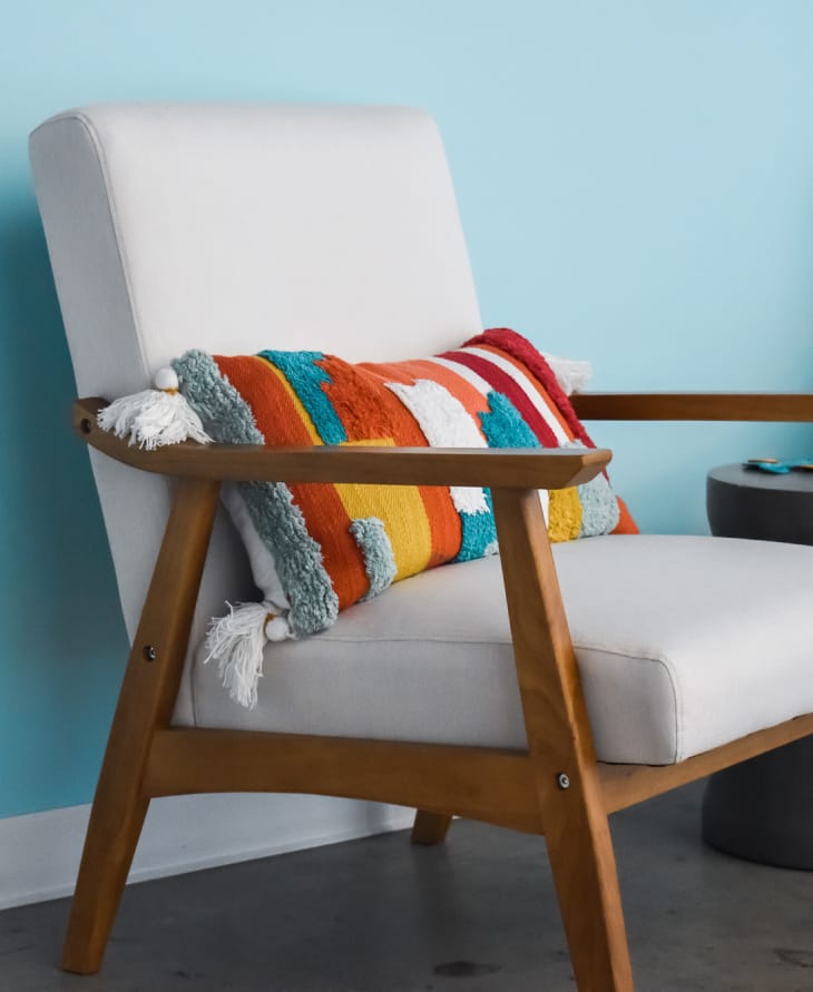 Chair situated near blue background