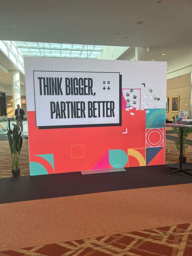 HubSpot Partner Program Think Bigger Partner Better banner at INBOUND 23