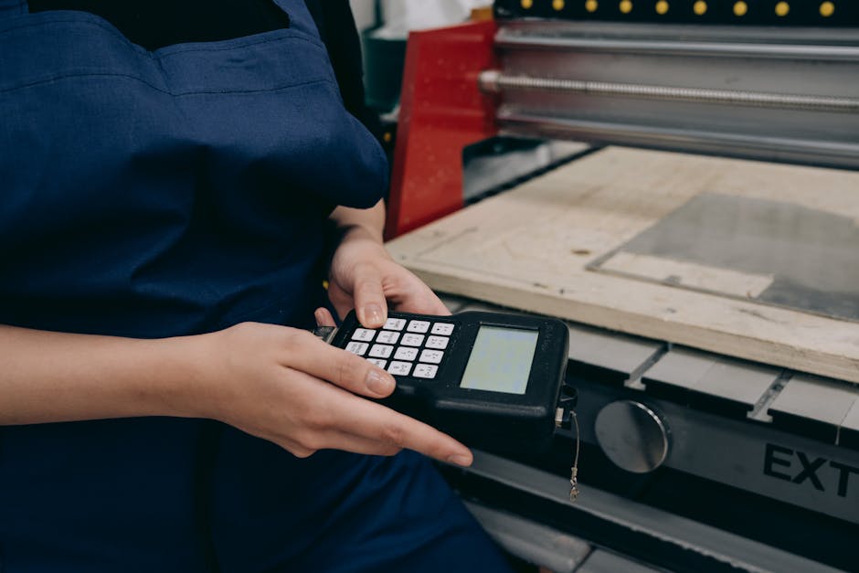 modern manufacturing facility with digital interfaces - web development for manufacturing